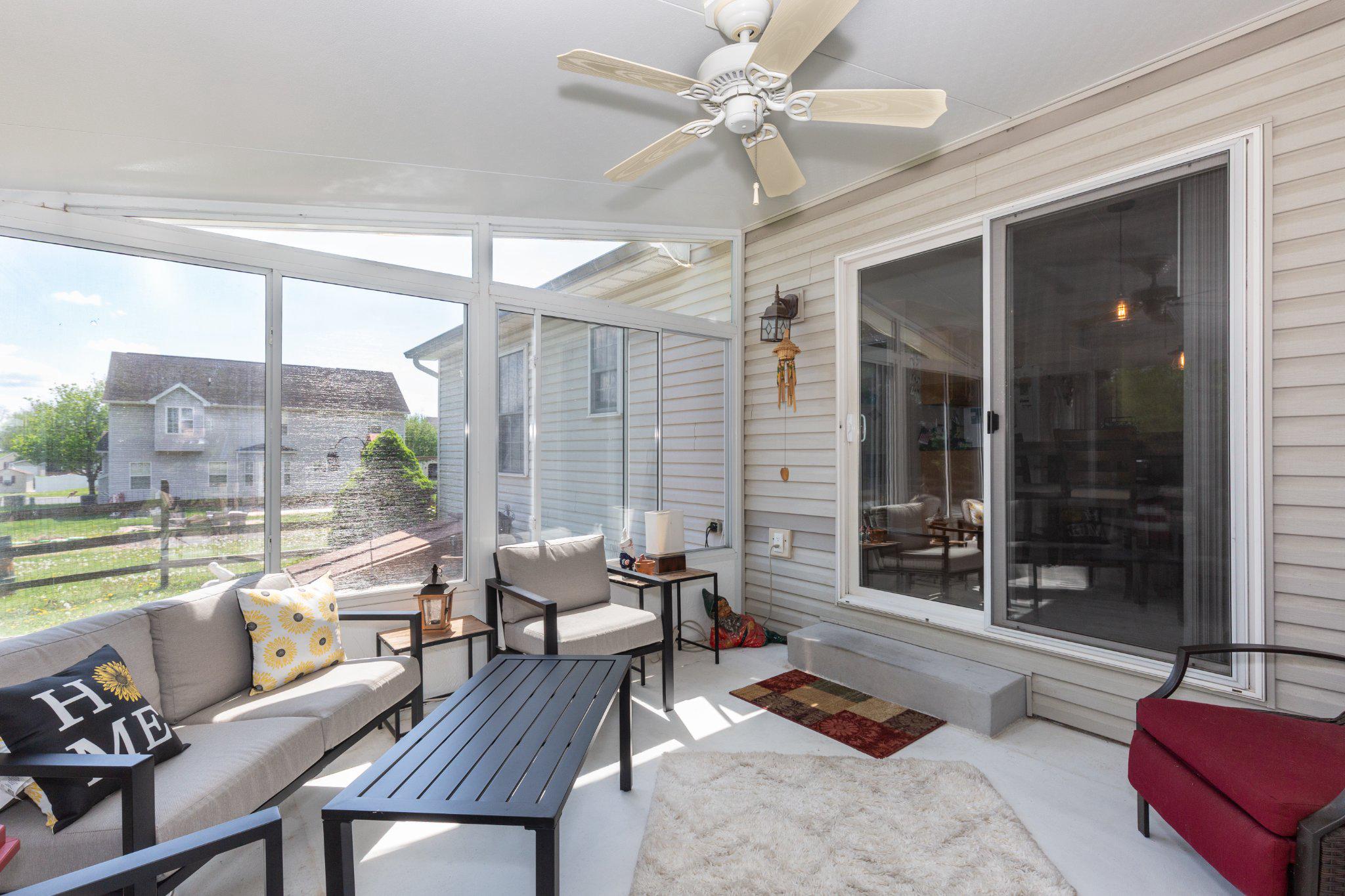 20 Union Street Littlestown, PA 17340 - Photo 18 of 58 Serene sunlit sunroom porch retreat.
