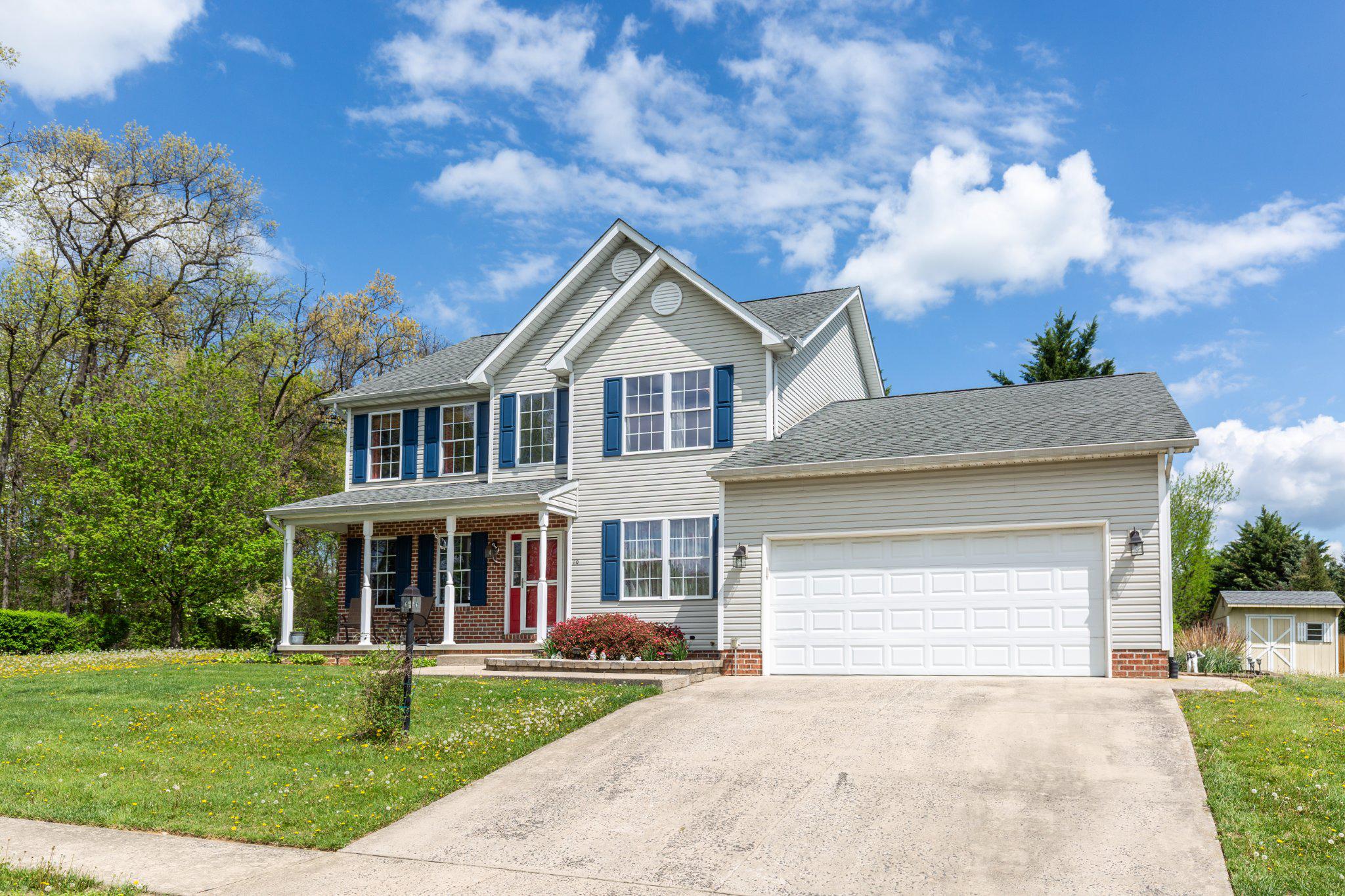 20 Union Street Littlestown, PA 17340 - Photo 2 of 58 a front view of a house with a yard and garage