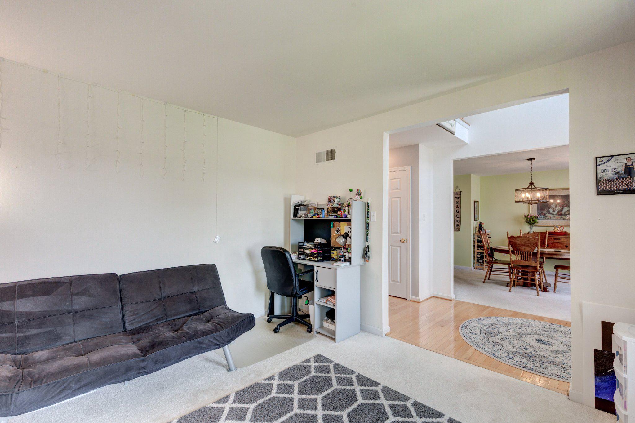 20 Union Street Littlestown, PA 17340 - Photo 24 of 58 a view of a workspace with furniture and a livingroom