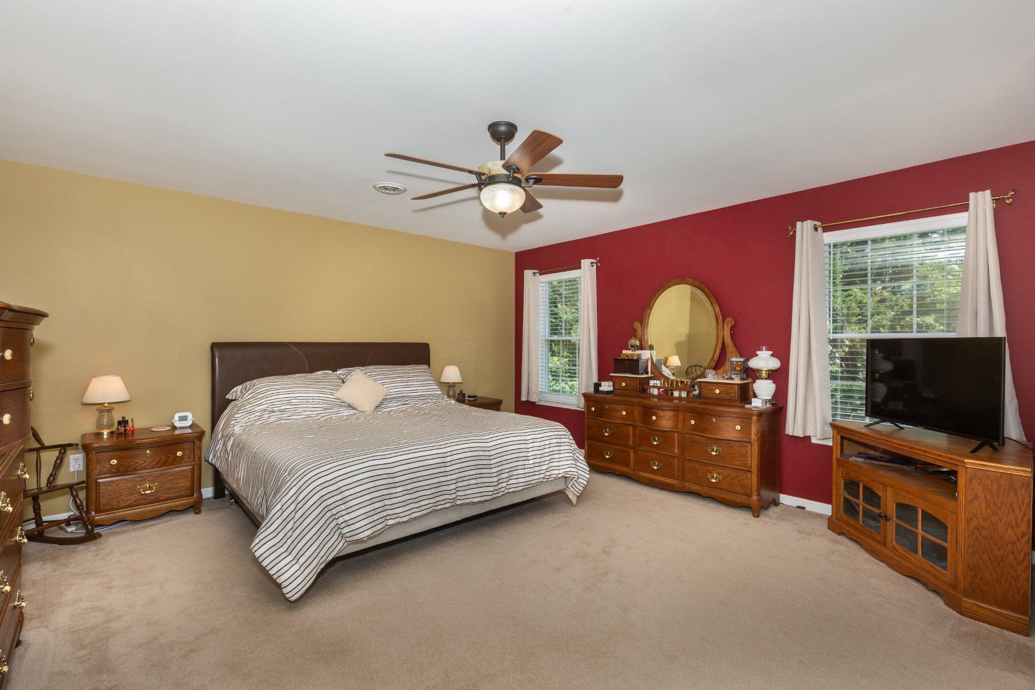 20 Union Street Littlestown, PA 17340 - Photo 30 of 58 a bedroom with a bed and a flat tv screen on dresser