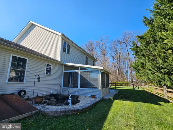 a front view of house with yard