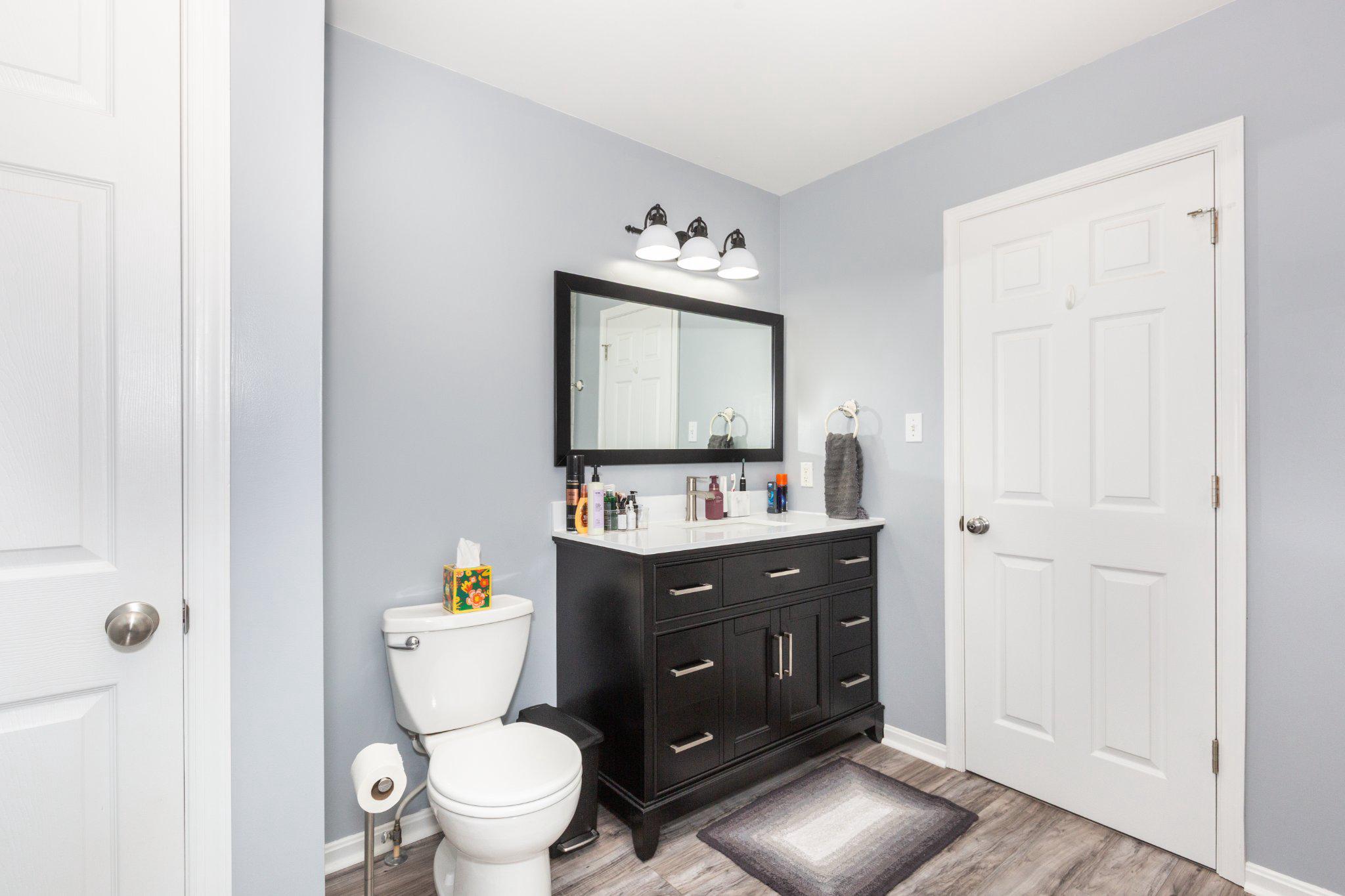 20 Union Street Littlestown, PA 17340 - Photo 33 of 58 a bathroom with a toilet sink and mirror