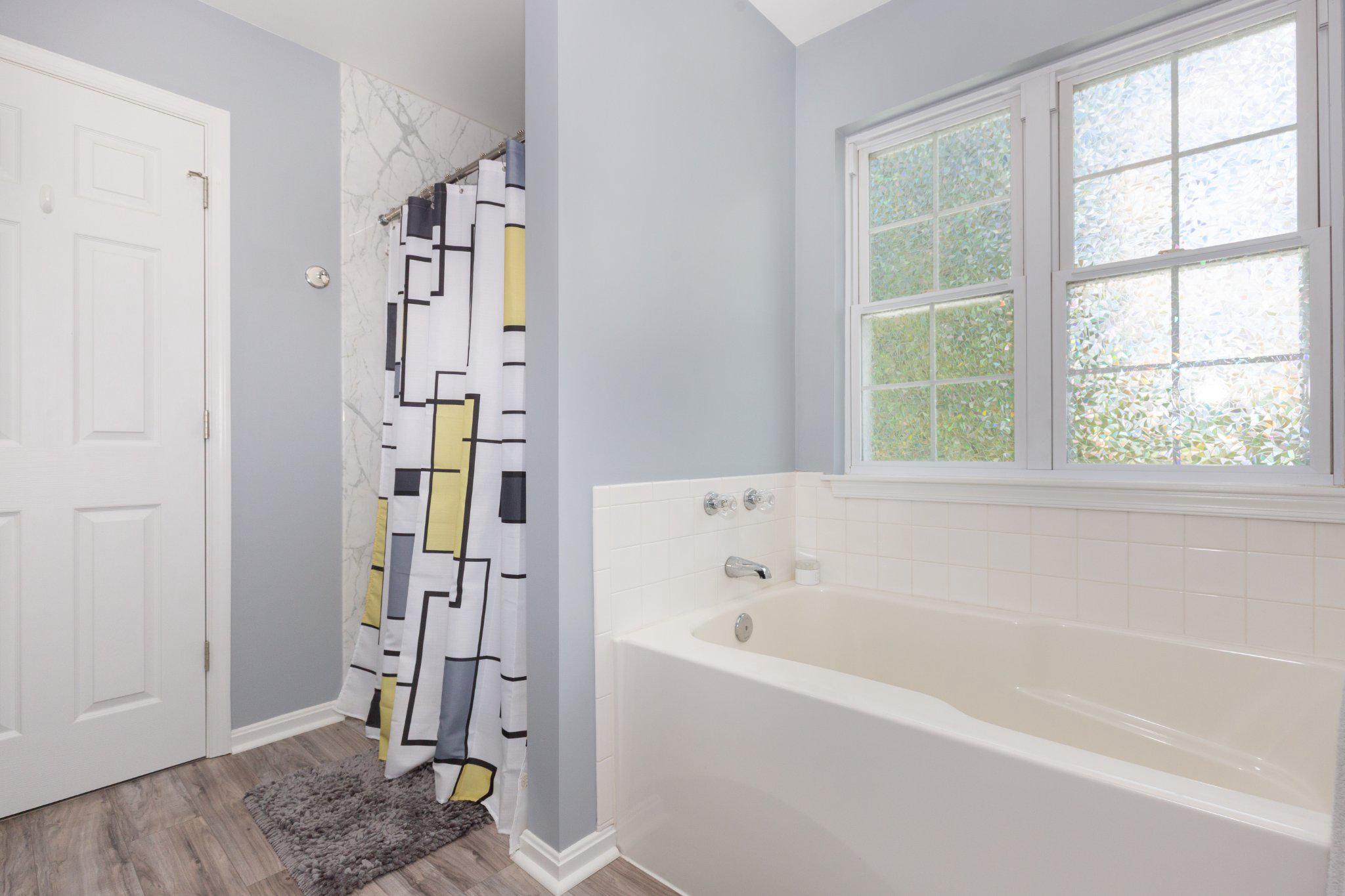 20 Union Street Littlestown, PA 17340 - Photo 35 of 58 a bathroom with a bathtub and a shower