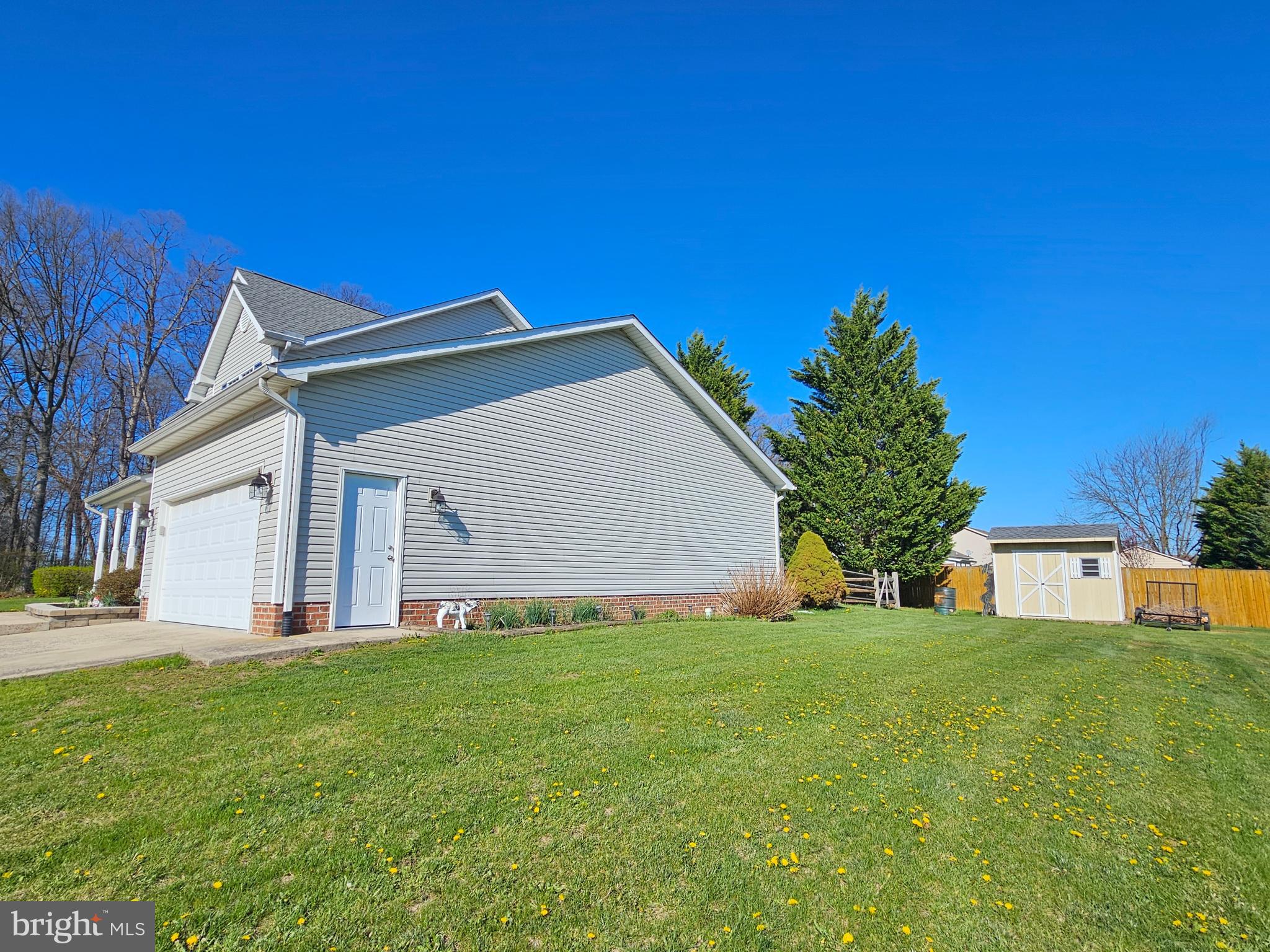 20 Union Street Littlestown, PA 17340 - Photo 5 of 7 right side garage door to side yard and shed