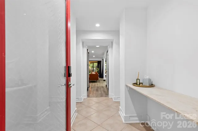 a view of a bathroom from the hallway