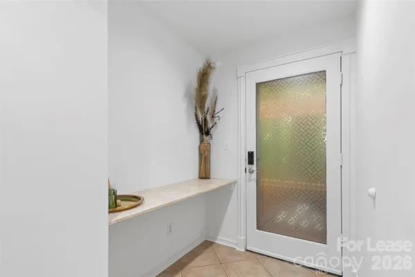 a view of hallway with shower