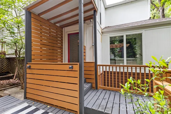 a outdoor living space with furniture and a potted plant
