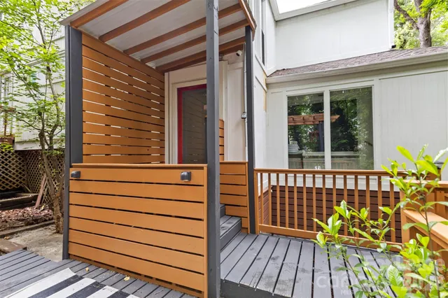a outdoor living space with furniture and a potted plant