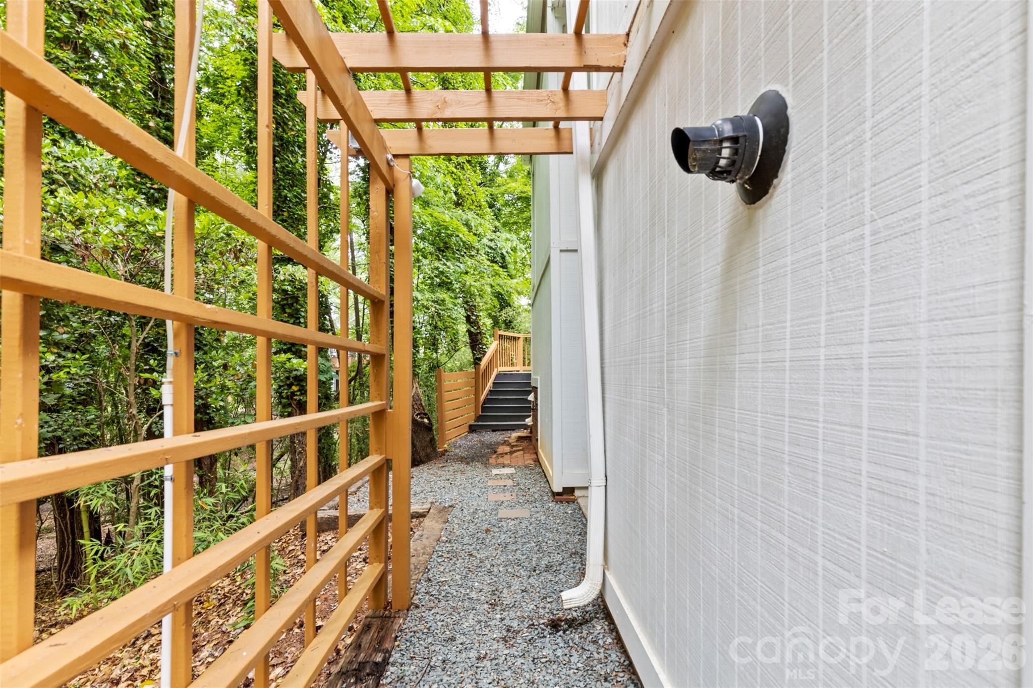 25033 Molokai Drive, Unit UPPR Tega Cay, SC 29708 - Photo 31 of 38 a view of a porch