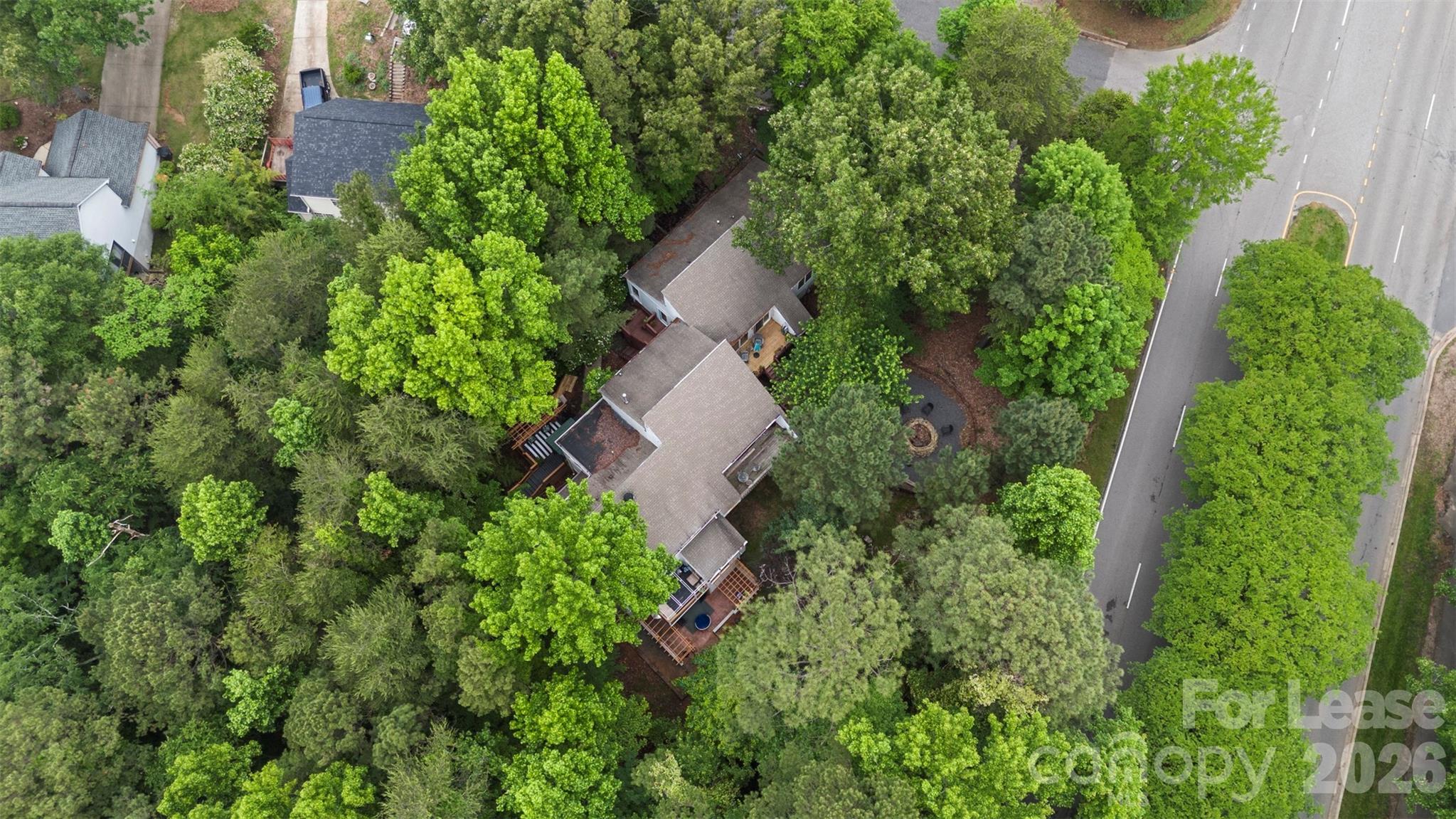 25033 Molokai Drive, Unit UPPR Tega Cay, SC 29708 - Photo 34 of 38 an aerial view of house with yard