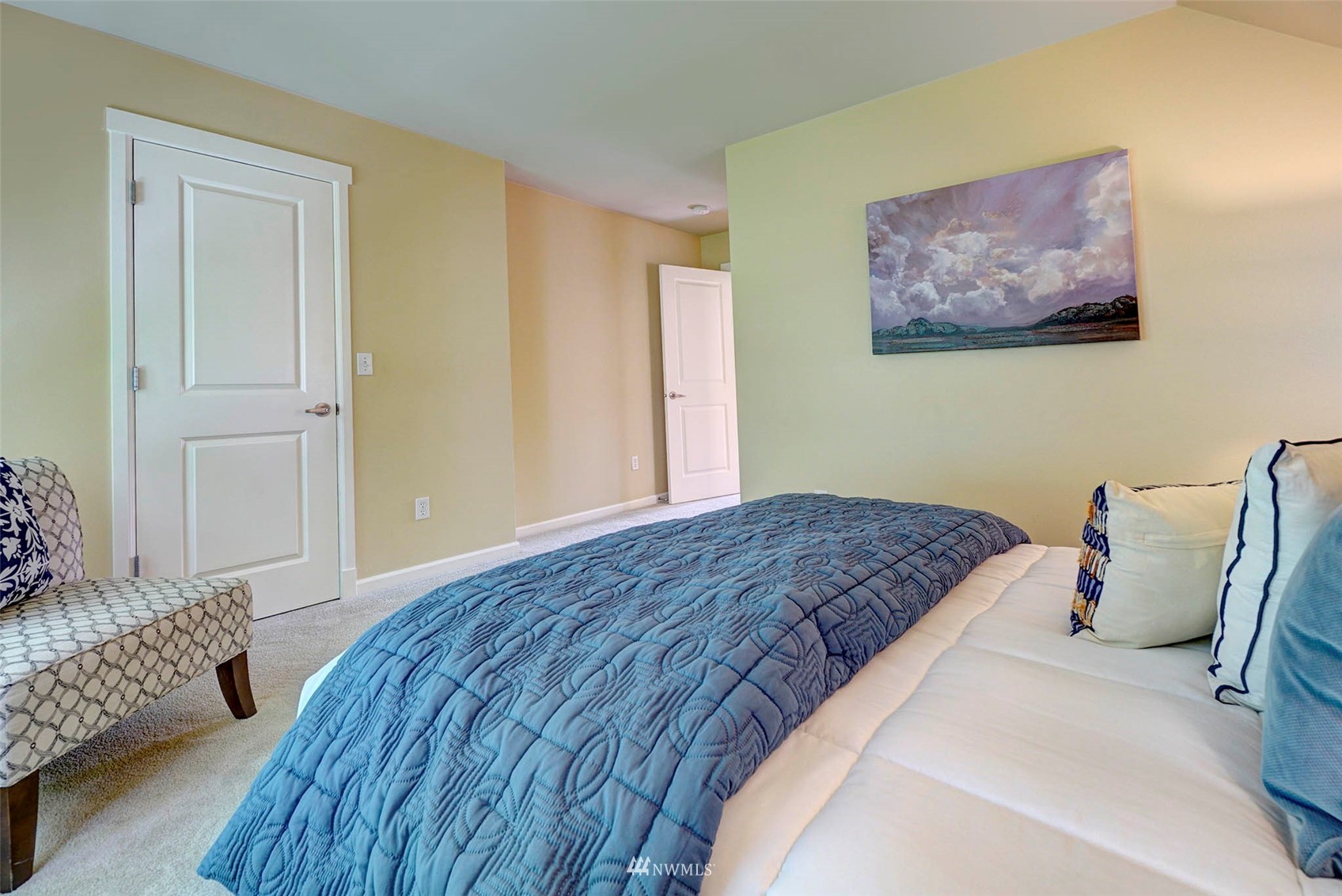 23914 33rd Drive Southeast Bothell, WA 98021 - Photo 14 of 28 a bedroom with a bed and wooden floor