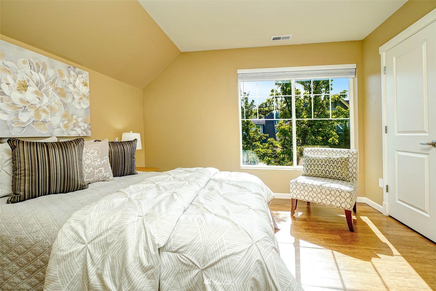 23914 33rd Drive Southeast Bothell, WA 98021 - Photo 18 of 28 a bedroom with a bed and wooden floor