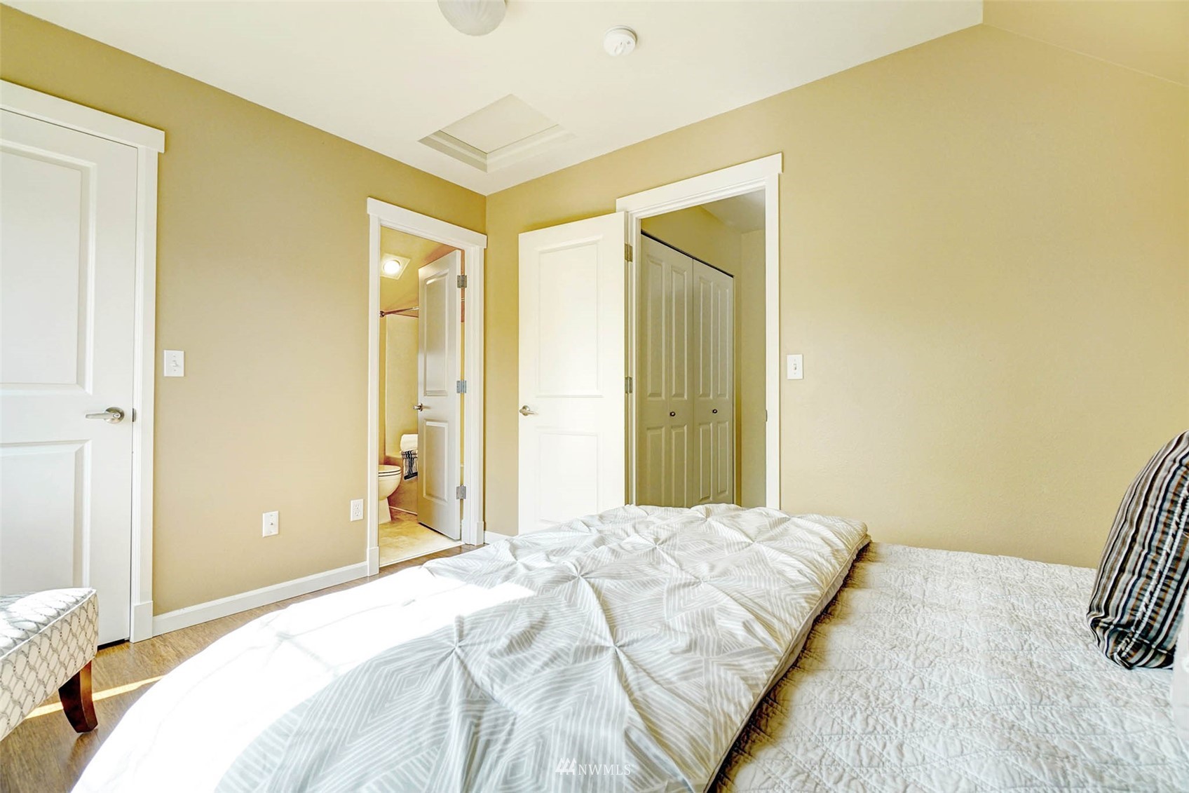 23914 33rd Drive Southeast Bothell, WA 98021 - Photo 19 of 28 a bedroom with a bed and a mirror