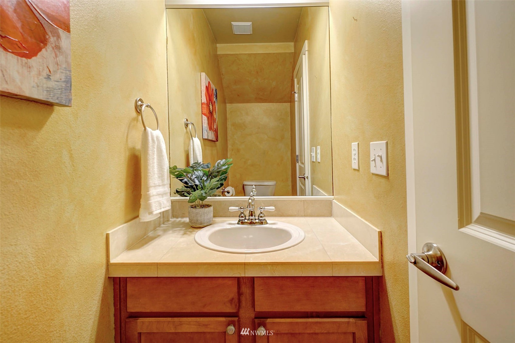 23914 33rd Drive Southeast Bothell, WA 98021 - Photo 23 of 28 a sink and a mirror