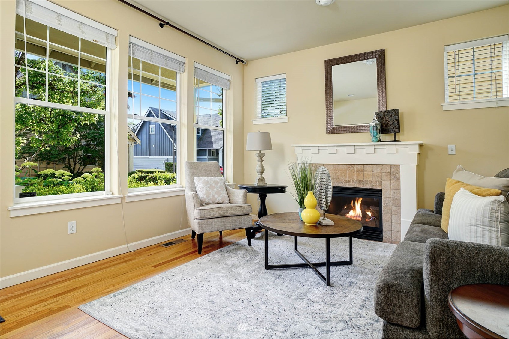 23914 33rd Drive Southeast Bothell, WA 98021 - Photo 4 of 28 a living room with furniture and a fireplace
