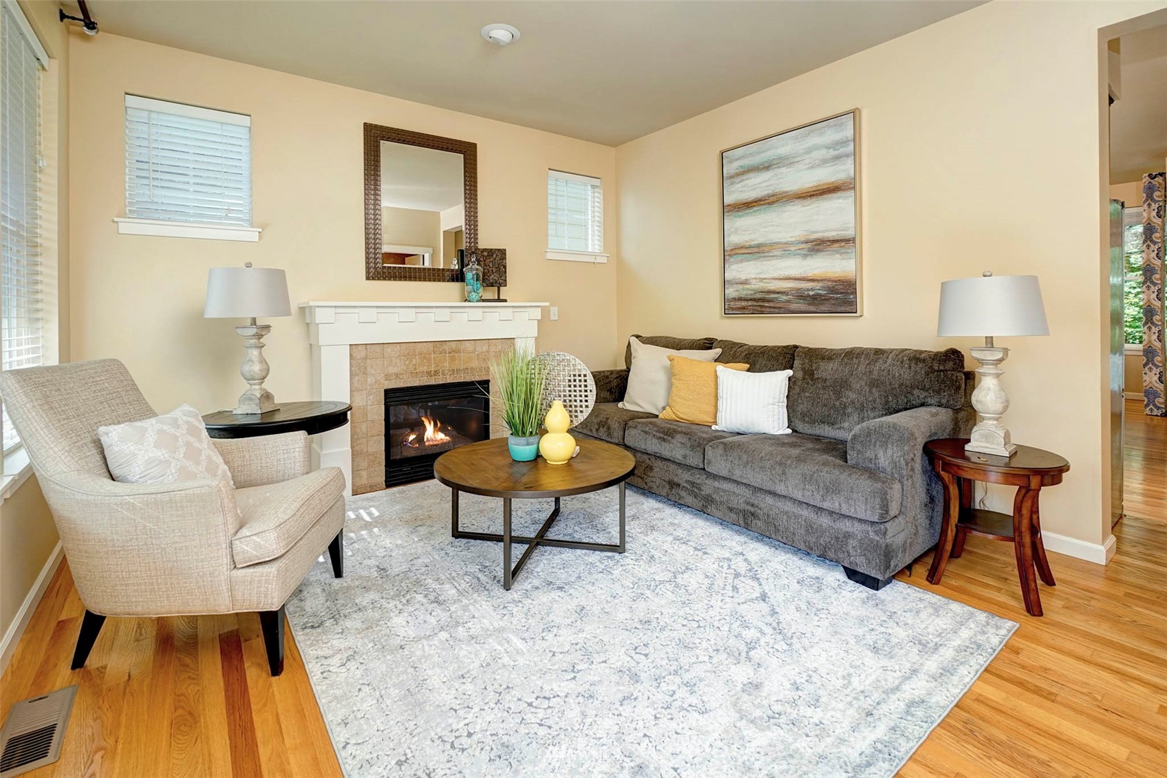 23914 33rd Drive Southeast Bothell, WA 98021 - Photo 5 of 28 a living room with furniture and a fireplace