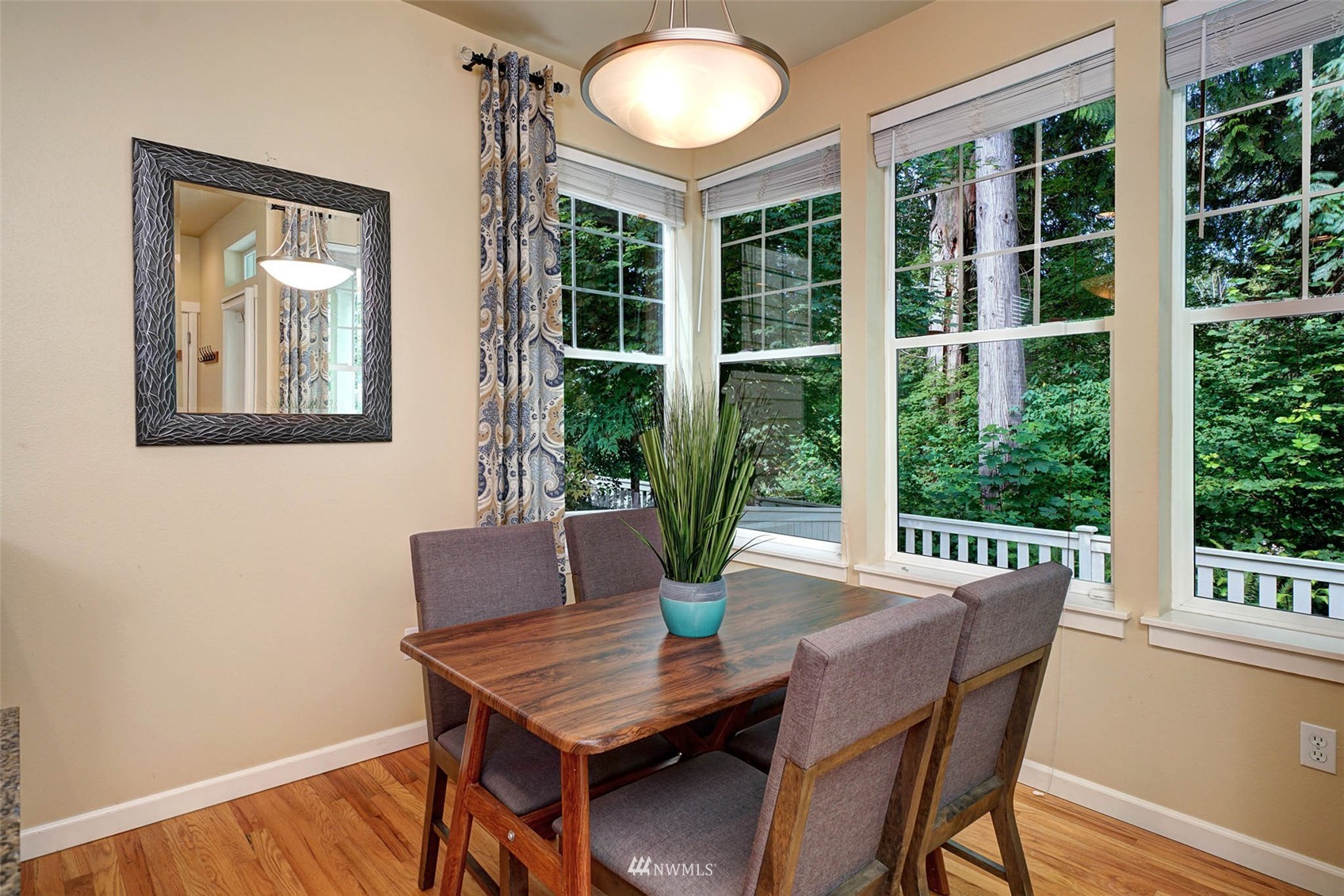 23914 33rd Drive Southeast Bothell, WA 98021 - Photo 9 of 28 a view of a dining room with furniture window and wooden floor