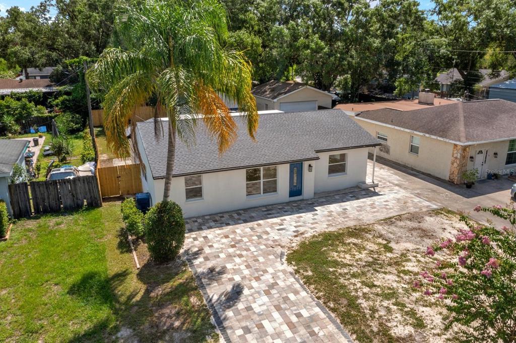 10707 North Rome Avenue Tampa, FL 33612 - Photo 1 of 35 a view of a house with a yard