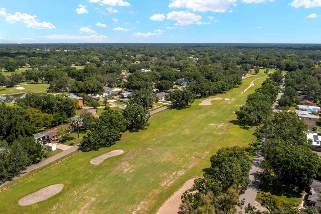 10707 North Rome Avenue Tampa, FL 33612 - Photo 16 of 35 a view of a lake with a city