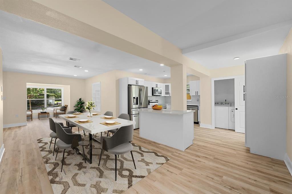 10707 North Rome Avenue Tampa, FL 33612 - Photo 23 of 35 a view of a dining room with furniture and wooden floor
