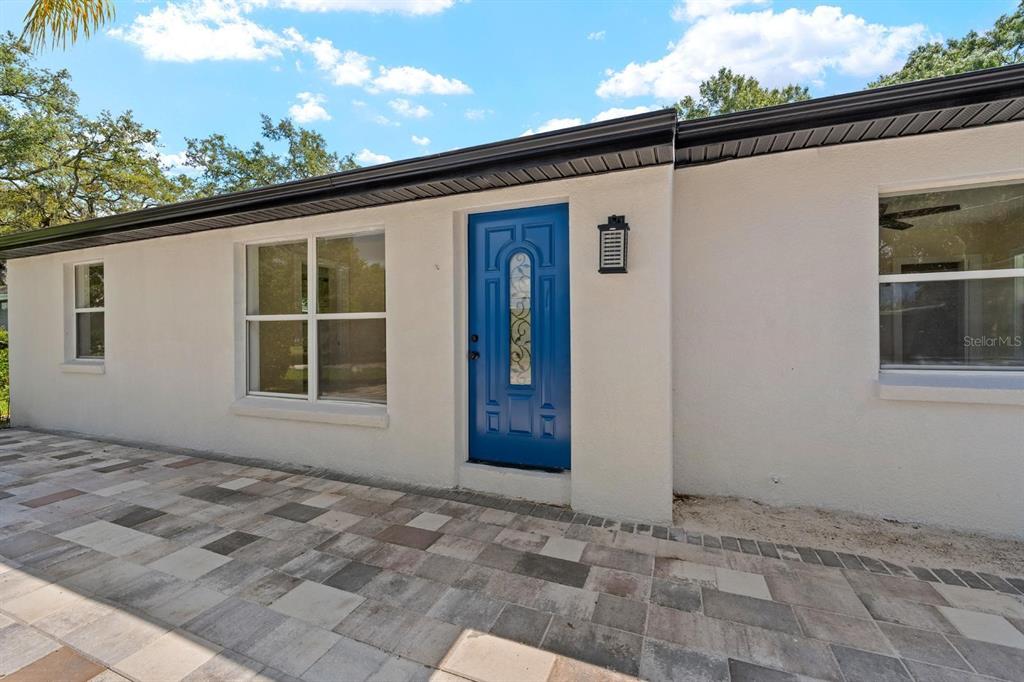 10707 North Rome Avenue Tampa, FL 33612 - Photo 6 of 35 a view of a house with a backyard