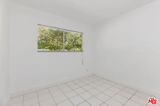 a view of an empty room with window