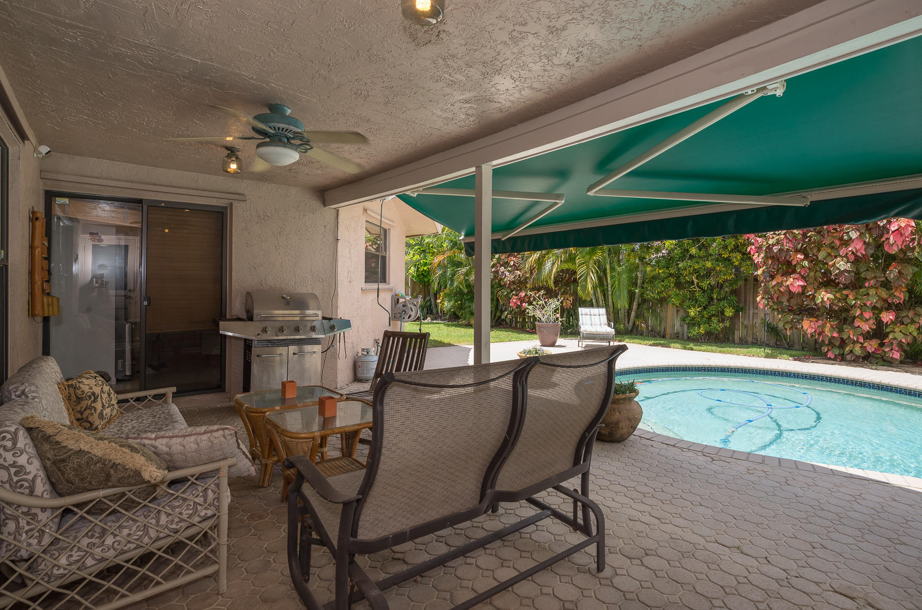 22118 Martella Avenue Boca Raton, FL 33433 - Photo 25 of 31 COVERED PATIO
