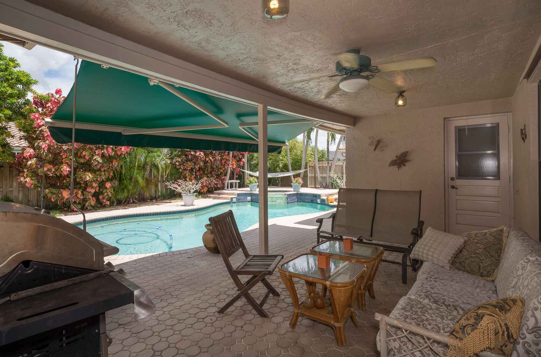 22118 Martella Avenue Boca Raton, FL 33433 - Photo 26 of 31 COVERED PATIO