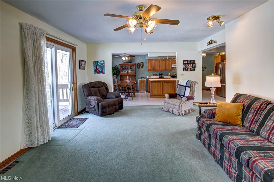 3711 Ruth Drive Brunswick, OH 44212 - Photo 6 of 35 Carpeted living room featuring ceiling fan