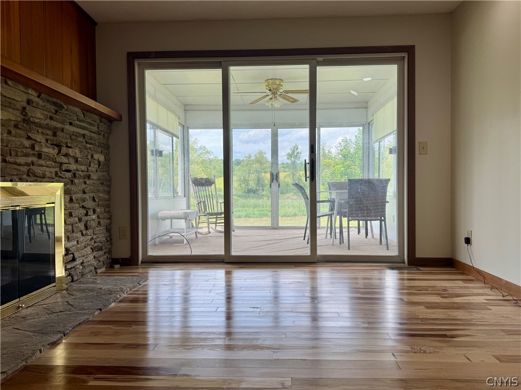 7043 Hutches Road Bath, NY 14810 - Photo 24 of 32 Family room with fireplace