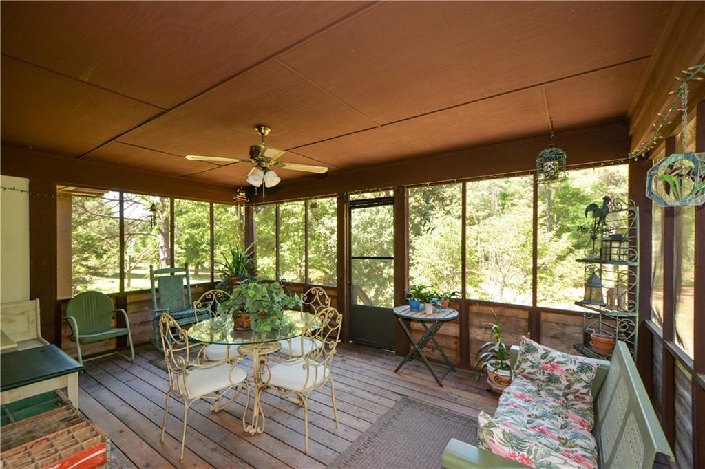130 Hawn Road Fayetteville, GA 30215 - Photo 37 of 67 a living room with furniture and a large window