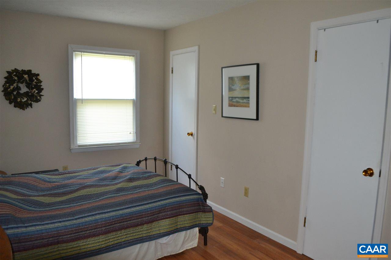 6239 Spring Hill Road Ruckersville, VA 22968 - Photo 20 of 25 a bedroom with a bed and a window