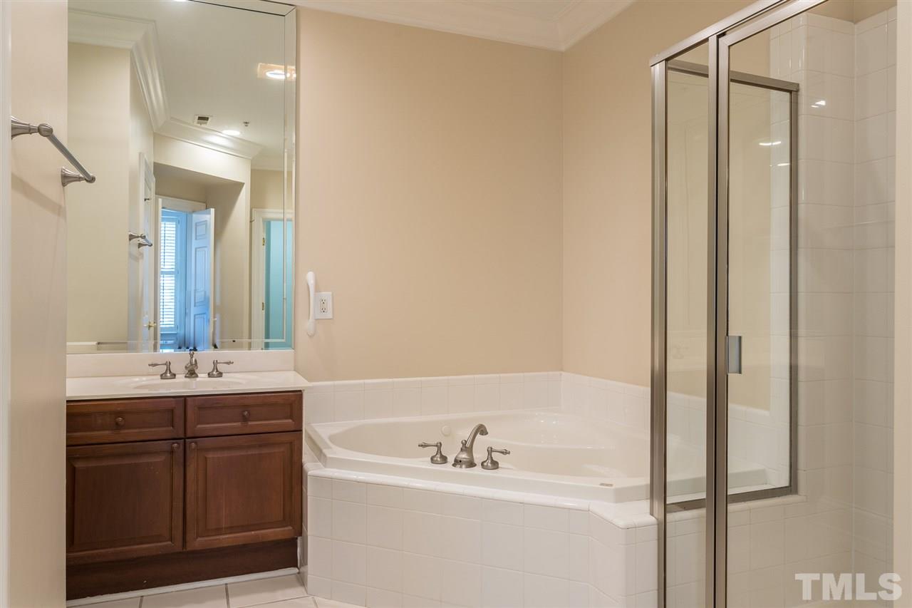 2901 Market Bridge Lane, Unit 204 Raleigh, NC 27608 - Photo 18 of 30 With Walk-In Closet