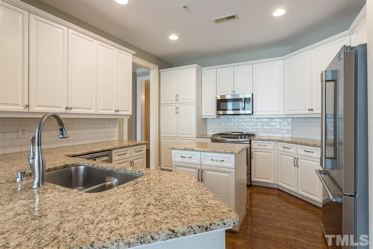 2901 Market Bridge Lane, Unit 204 Raleigh, NC 27608 - Photo 7 of 30 New Granite Tops