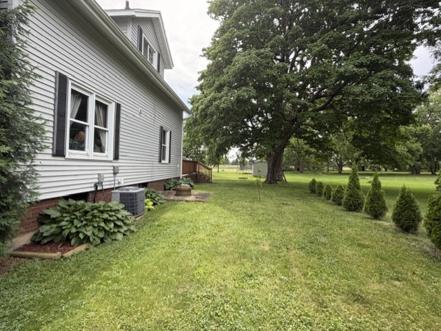 4373 East 250th Road Mendota, IL 61342 - Photo 20 of 26 a backyard of a house with lots of green space