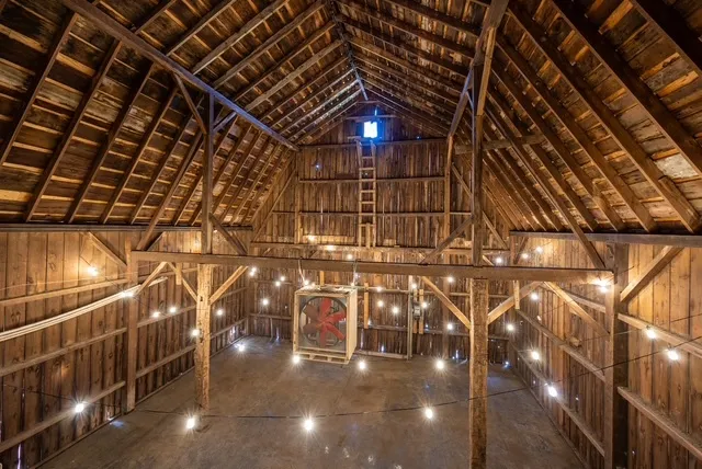 a view of a brick building with many windows