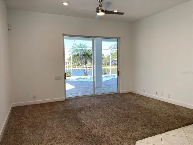 an empty room with sliding door