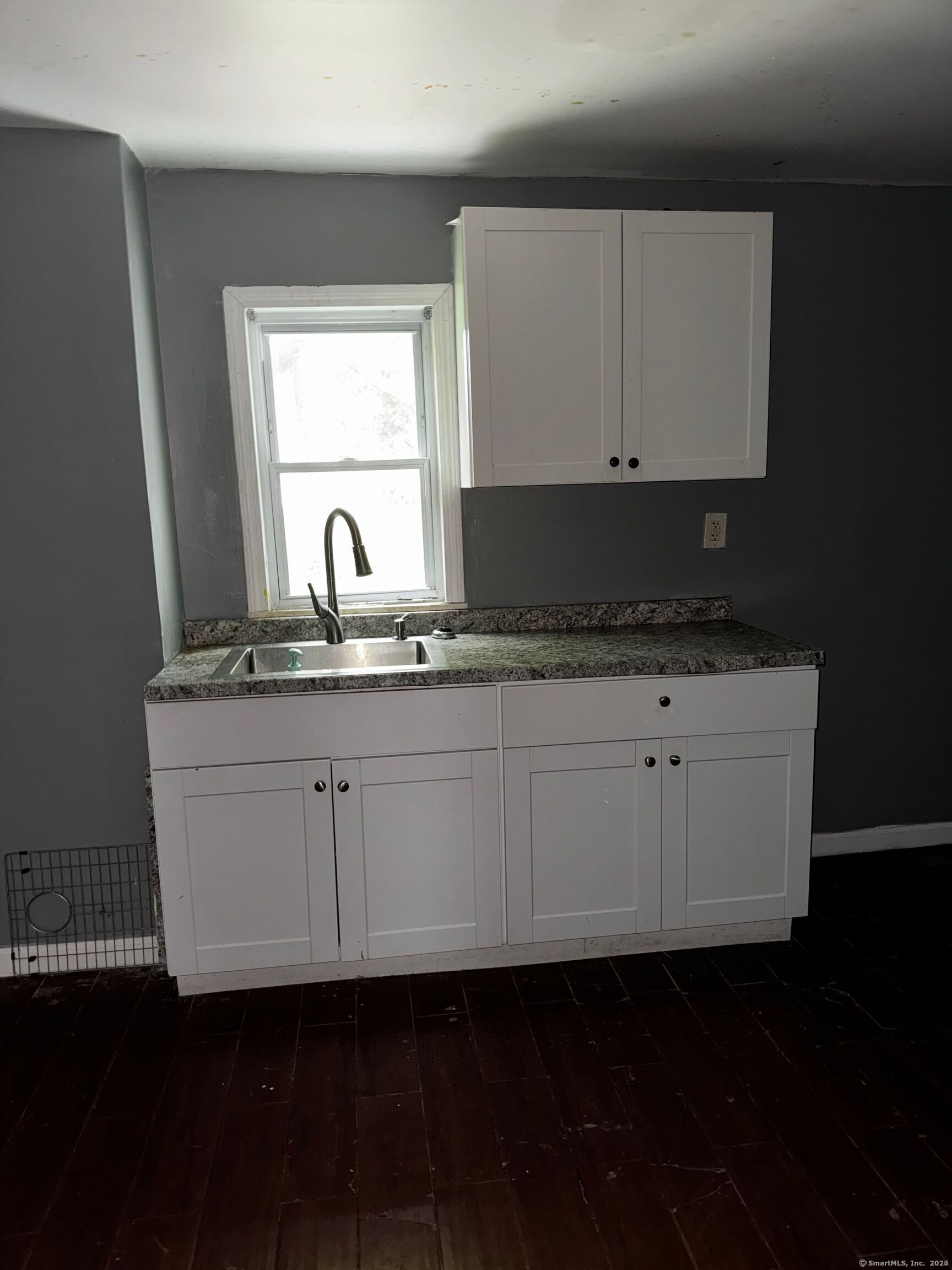 254 Starr Street New Haven, CT 06511 - Photo 4 of 8 a kitchen with a sink and cabinets