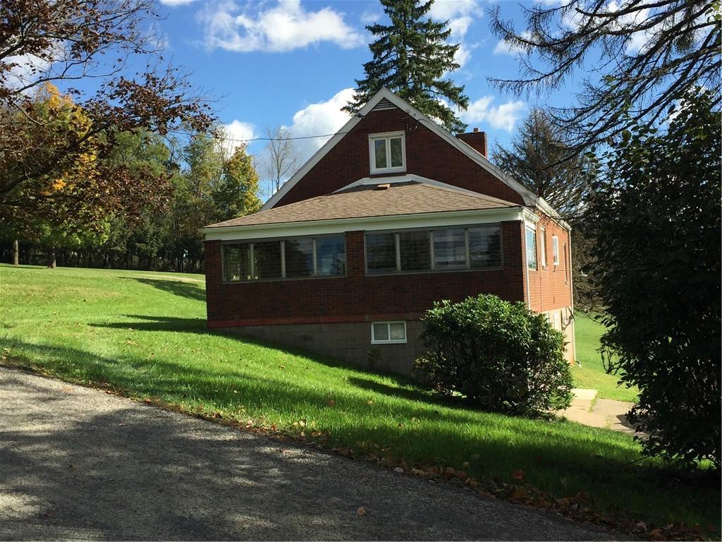 522 Middletown Road New Stanton, PA 15672 - Photo 6 of 22 a front view of a house with a yard