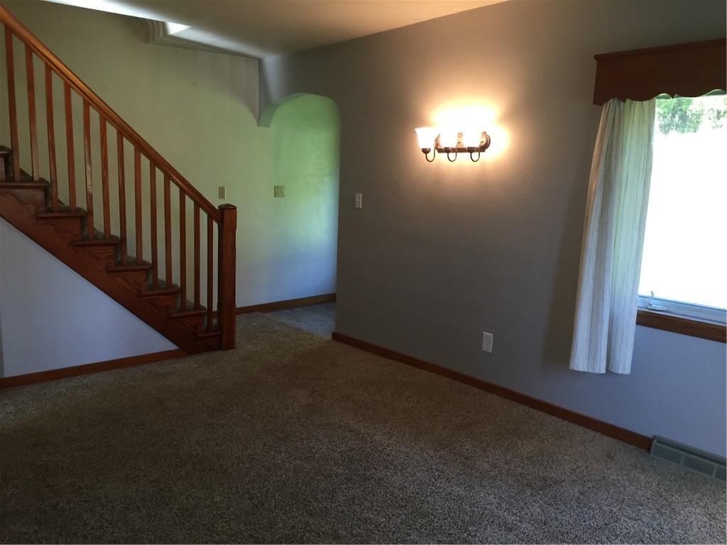 522 Middletown Road New Stanton, PA 15672 - Photo 8 of 22 a view of empty room with stairs