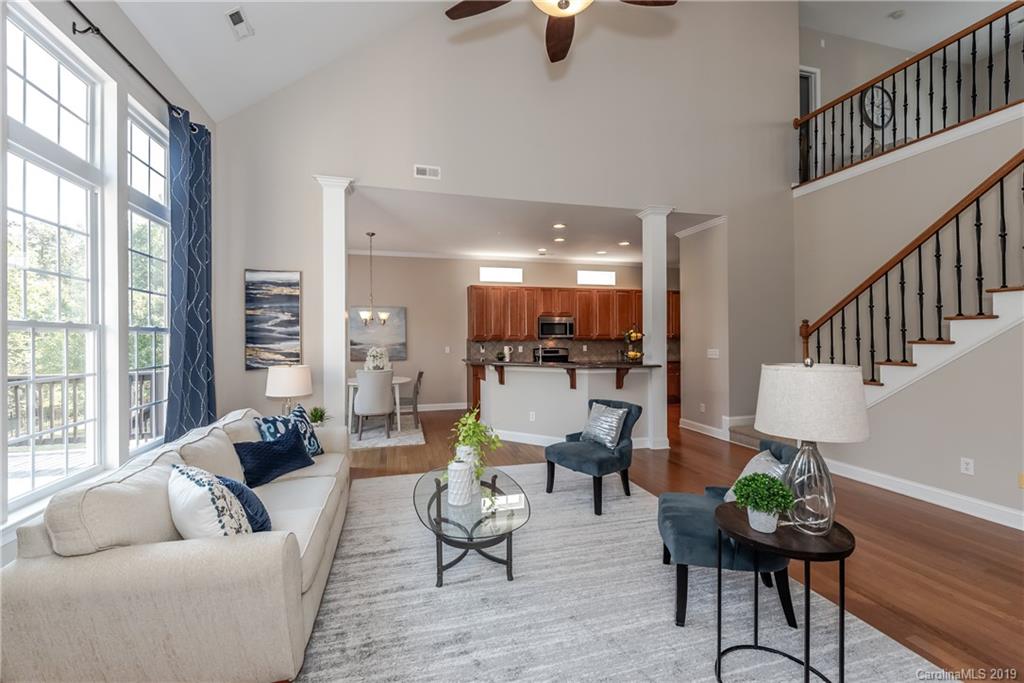 872 Treasure Court Fort Mill, SC 29708 - Photo 11 of 42 a living room with furniture and wooden floor