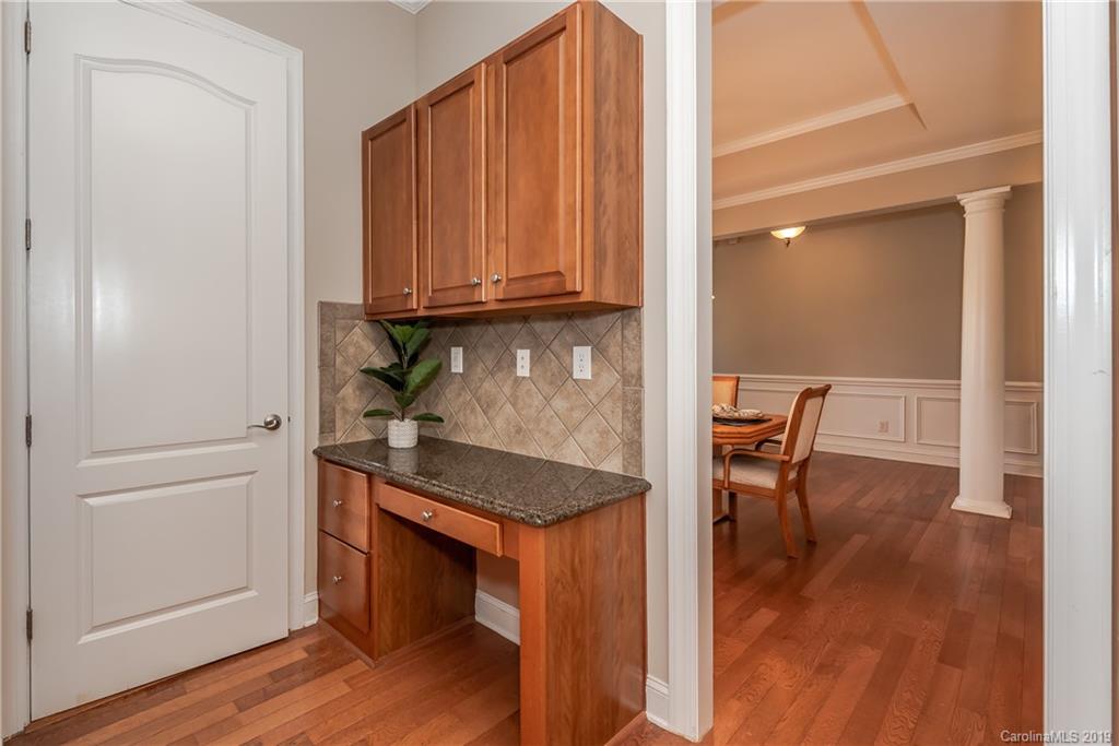 872 Treasure Court Fort Mill, SC 29708 - Photo 18 of 42 a view of kitchen with furniture and wooden floor