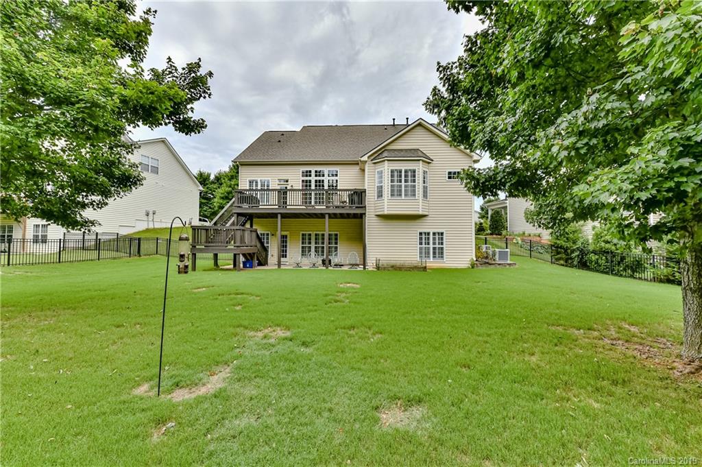 872 Treasure Court Fort Mill, SC 29708 - Photo 41 of 42 a view of a house with a yard and sitting area