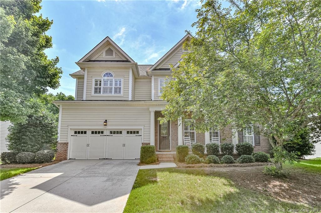 872 Treasure Court Fort Mill, SC 29708 - Photo 42 of 42 a view of house with yard and trees in the background