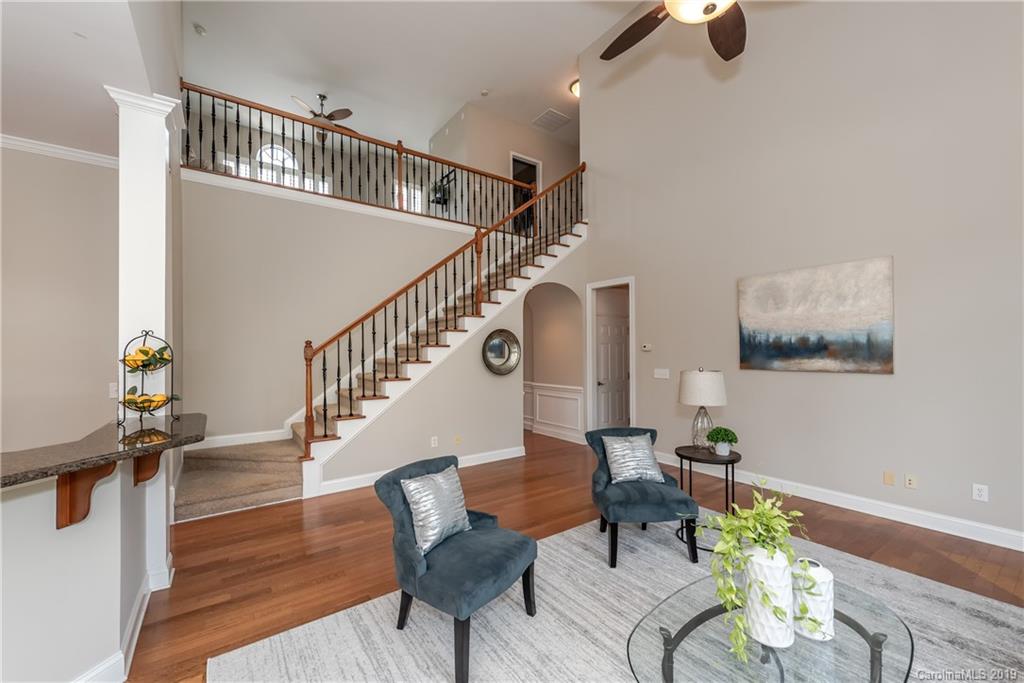 872 Treasure Court Fort Mill, SC 29708 - Photo 8 of 42 a view of entryway and hall with wooden floor