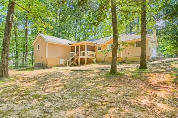 a house with trees in front of it