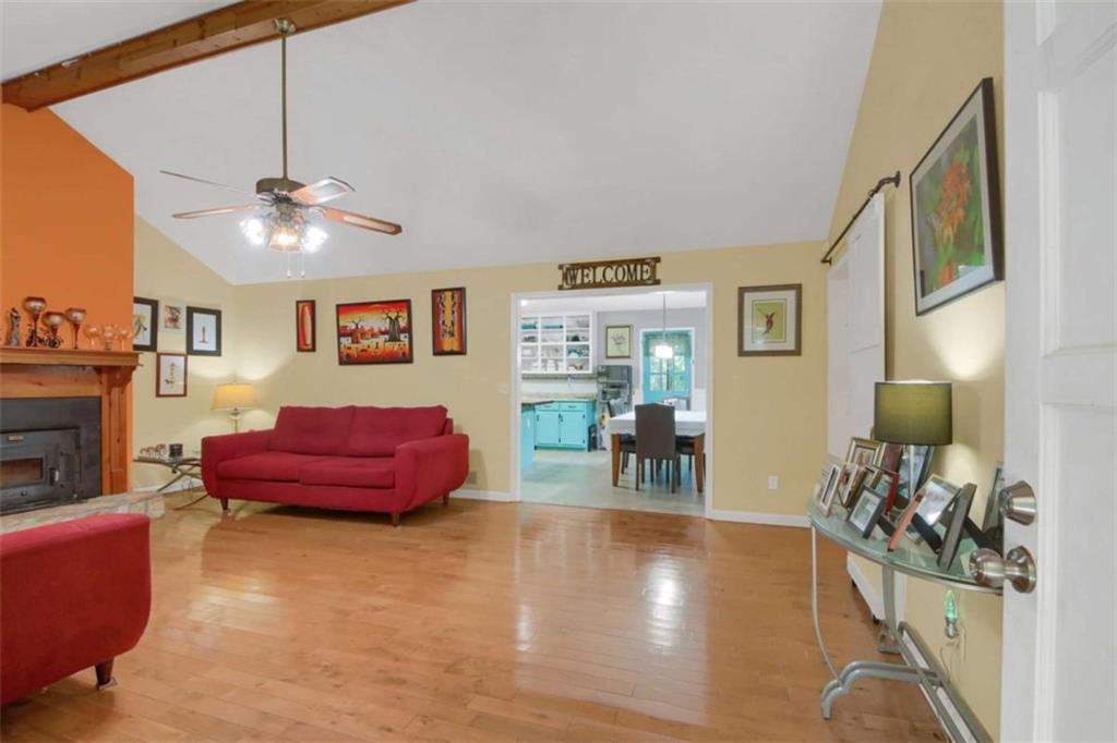 112 Bridget Drive Hampton, GA 30228 - Photo 3 of 26 a living room with furniture and wooden floor