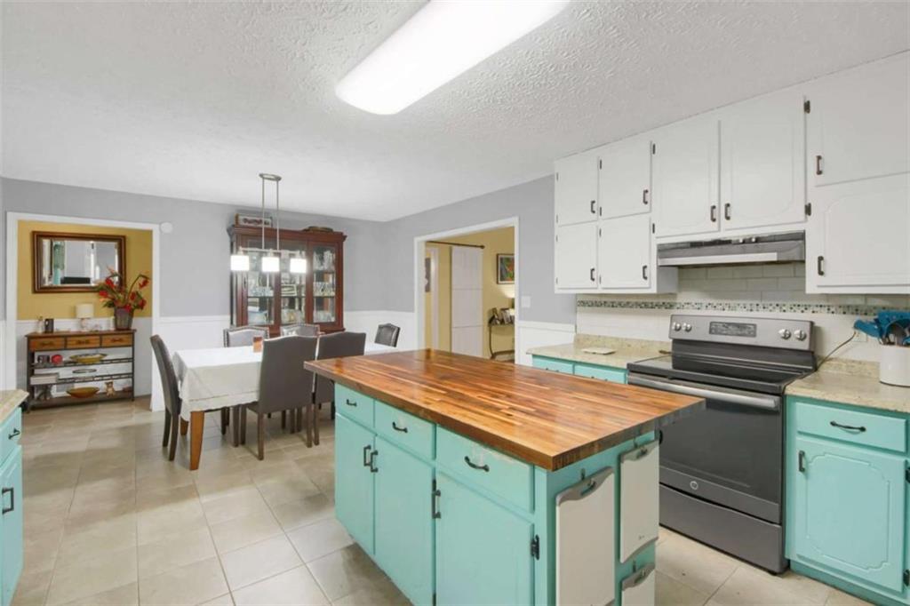 112 Bridget Drive Hampton, GA 30228 - Photo 10 of 26 a kitchen that has a cabinets counter space and stainless steel appliances
