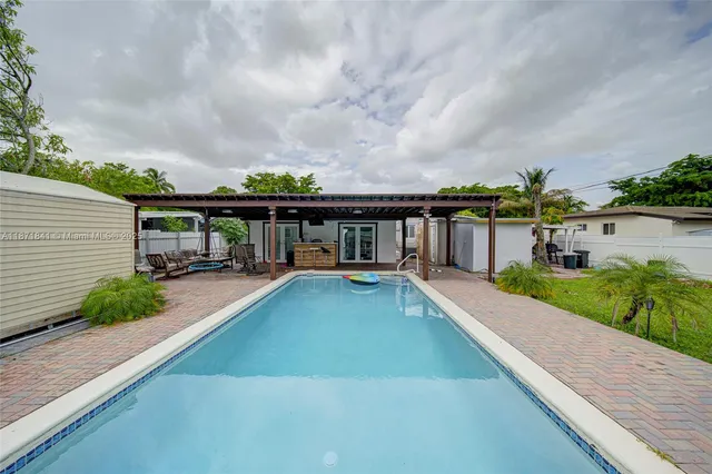 a view of a house with a swimming pool