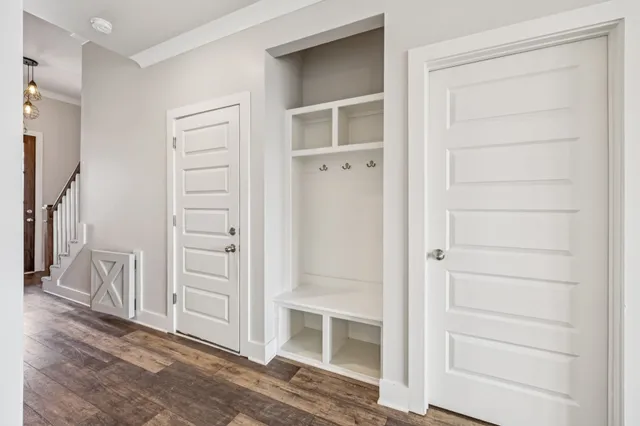 a view of a hallway with toilet